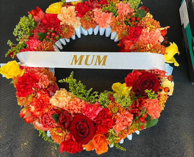 The Florist - Red & Orange Funeral Wreath