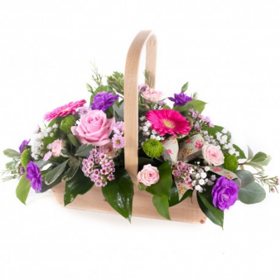 Basket collection - Shower them with love with this cutesy collection of seasonal flowers in pretty pastels. Beautifully arranged and stylishly presented in a traditional basket.