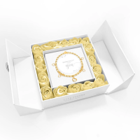 ESPECIALLY FOR YOU - GOLD HEARTS CHARM BRACELET IN FLOWER BOX - Introducing our range of charms bracelets elegantly packaged in a luxury gift box lined with yellow roses. The magnetic heart fastening design invites you to reveal the jewellery within, adding an element of surprise and charm.

Crafted with exceptional care, these beautiful 5 mm beaded bracelets are made from gold beads and adorned with a heart charm, encrusted with sparkling stones. The design is beautifully complemented by gold-plated rondelles and crystal beads.
Presented on a soft suede platform with a heartfelt message: "Especially for you."

The bracelet measures 17.5 cm, with just enough stretch for a comfortable fit.

This collection embodies the perfect gift, merging elegance, sentiment, and style to create an accessory that is as timeless as it is meaningful.

Celebrate love and special moments with this enchanting piece that adds a touch of magic to any occasion!